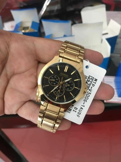 Casio MTP-V300G-1AUDF product hand photo with model tag